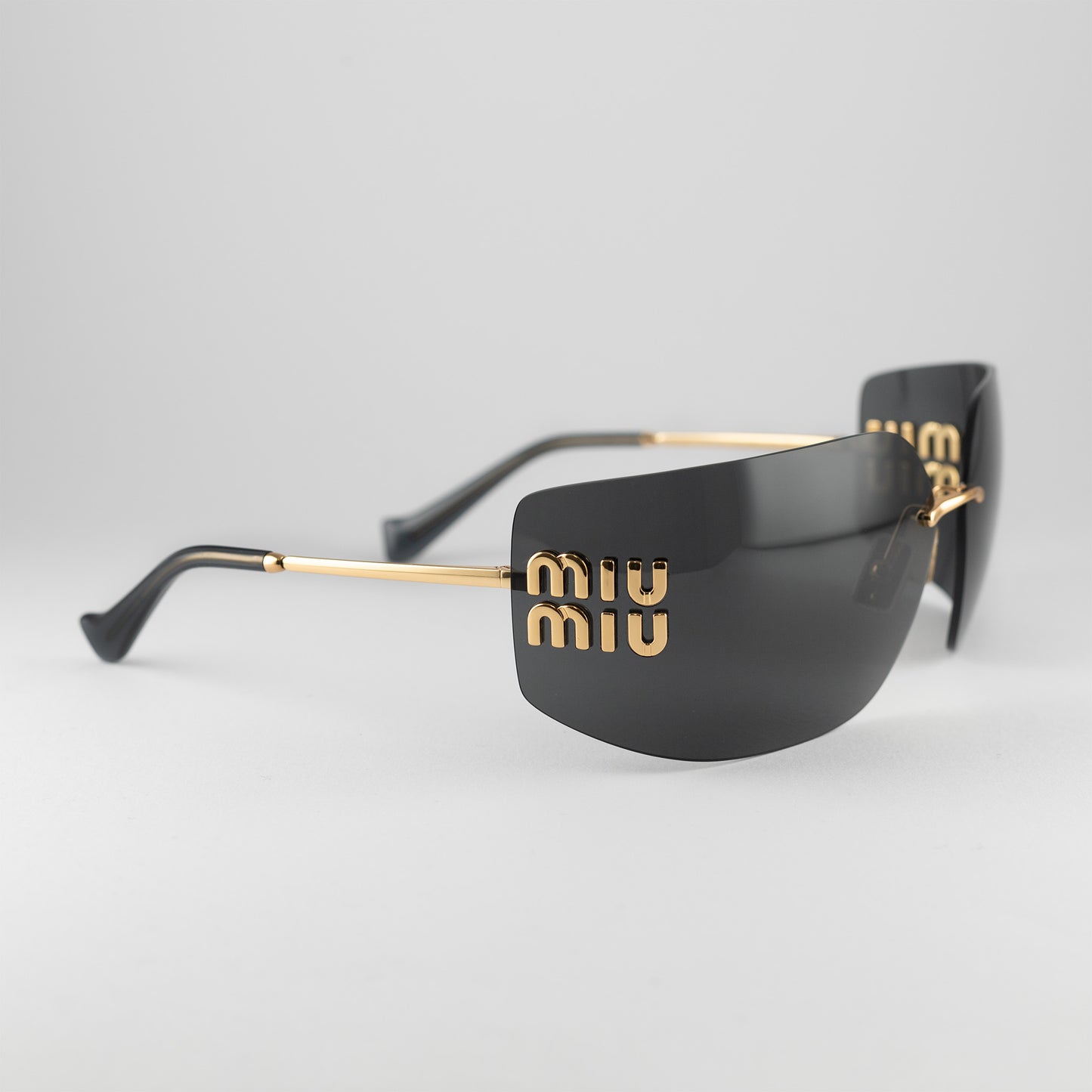 Occhiale da sole Miu Miu SMU 54YS 5AK-5S0 Black - Clyra Eyewear