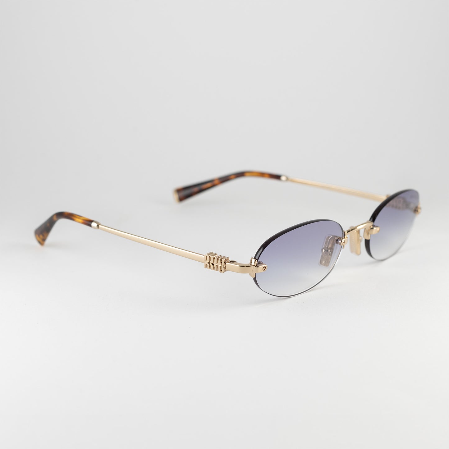 Occhiale da sole Miu Miu SMU A54 ZVN-80O Gold - Clyra Eyewear