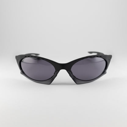 Occhiale da sole Oakley Plantaris OO9437 0163 Black - Clyra Eyewear