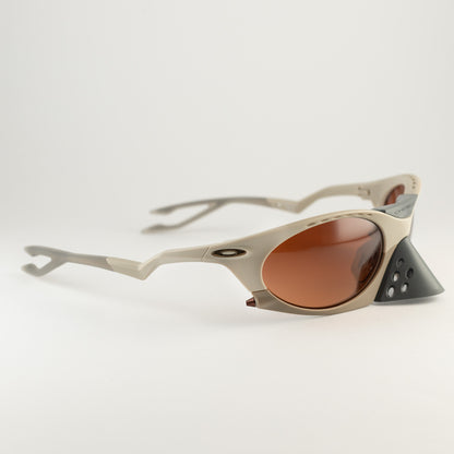 Occhiale da sole Oakley Plantaris OO9437 0263 Beige - Clyra Eyewear